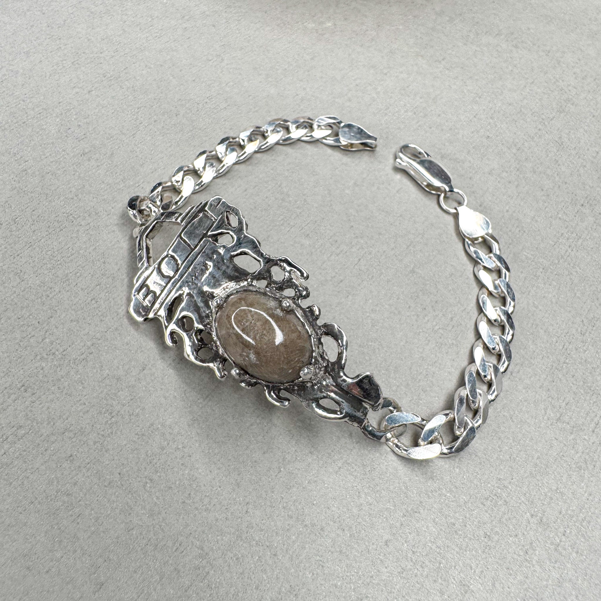 A key with Petoskey stone Bracelet.