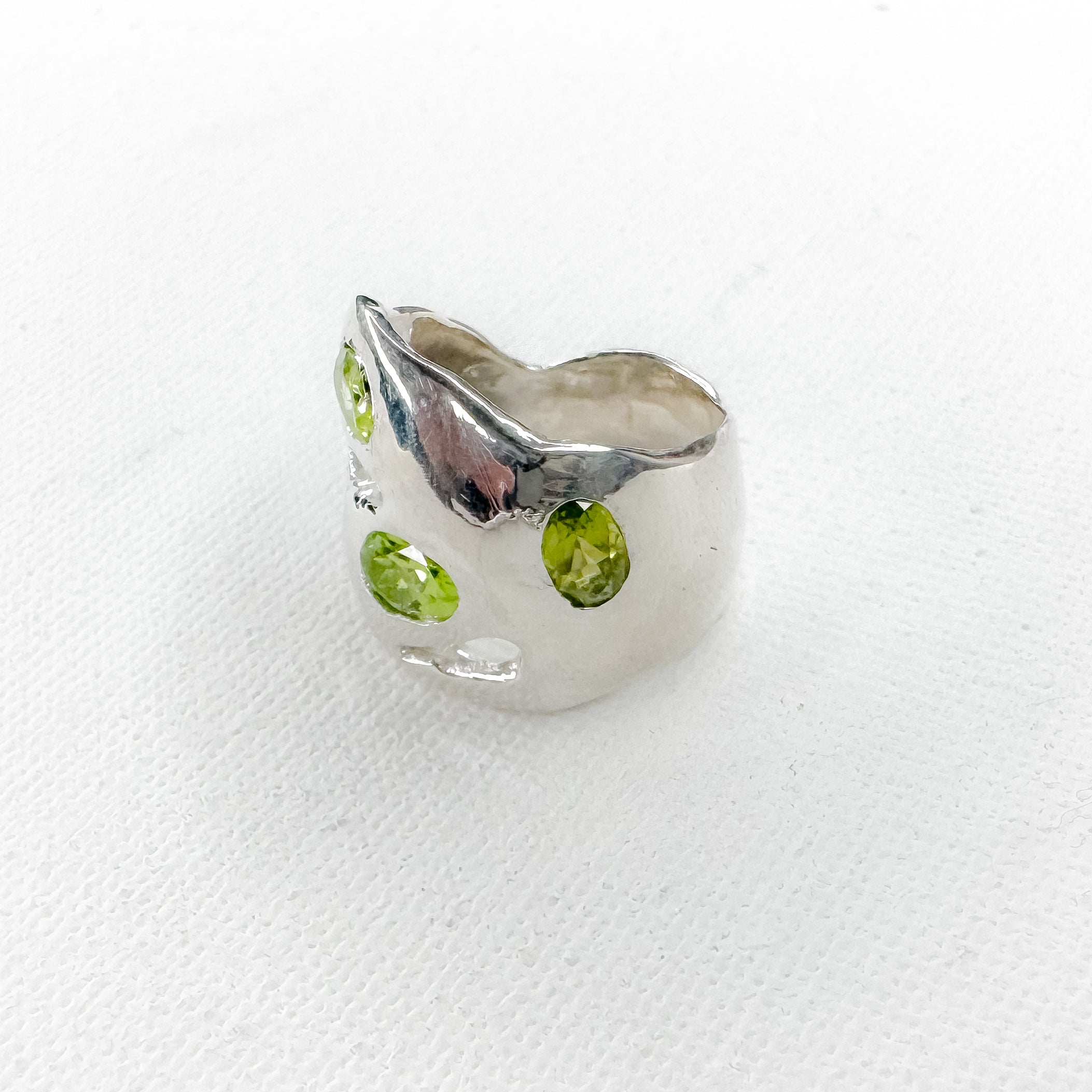 Three peridots Ring