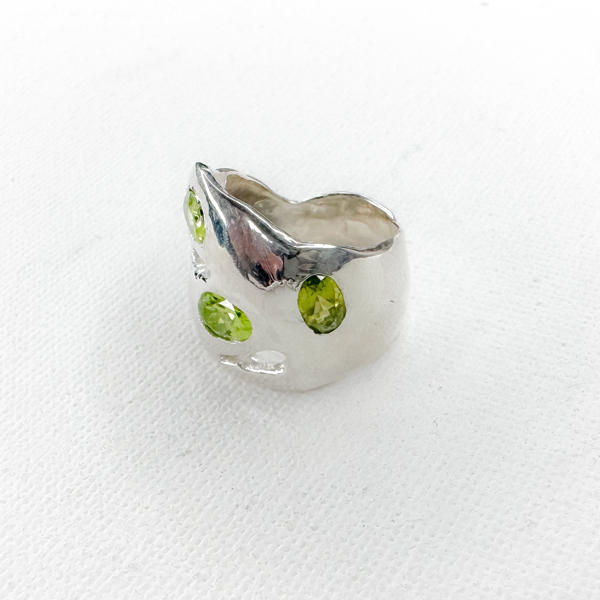 Three peridots Ring