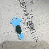 A key with Petoskey stone Bracelet