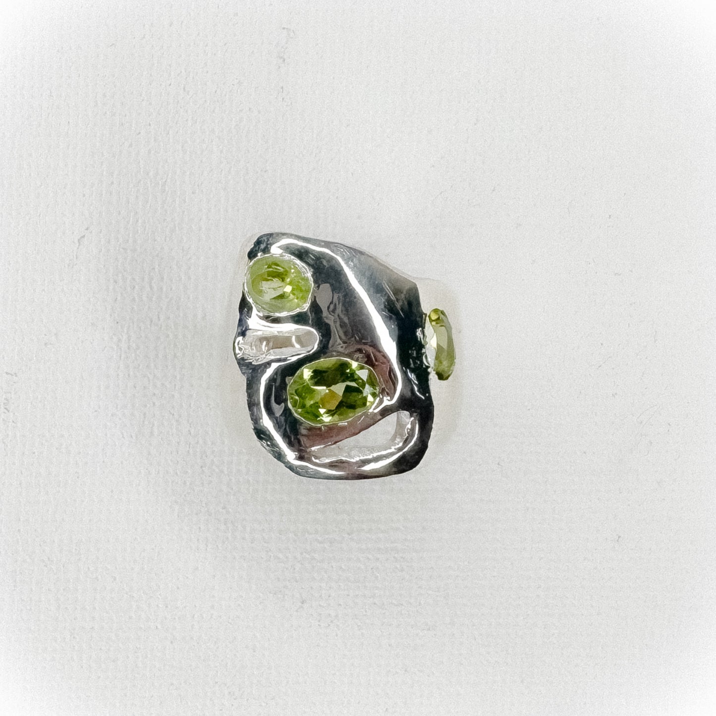 Three peridots Ring