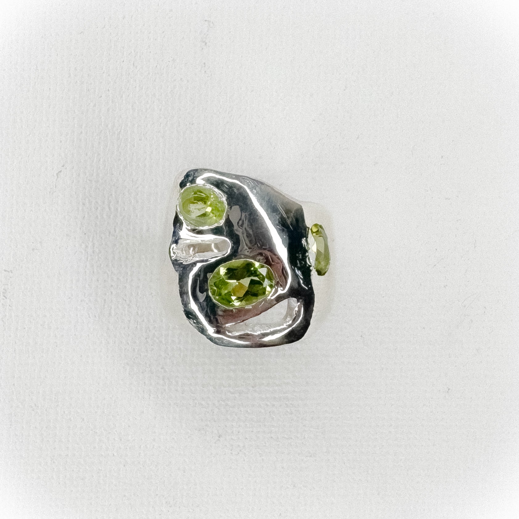 Three peridots Ring