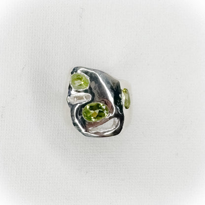 Three peridots Ring