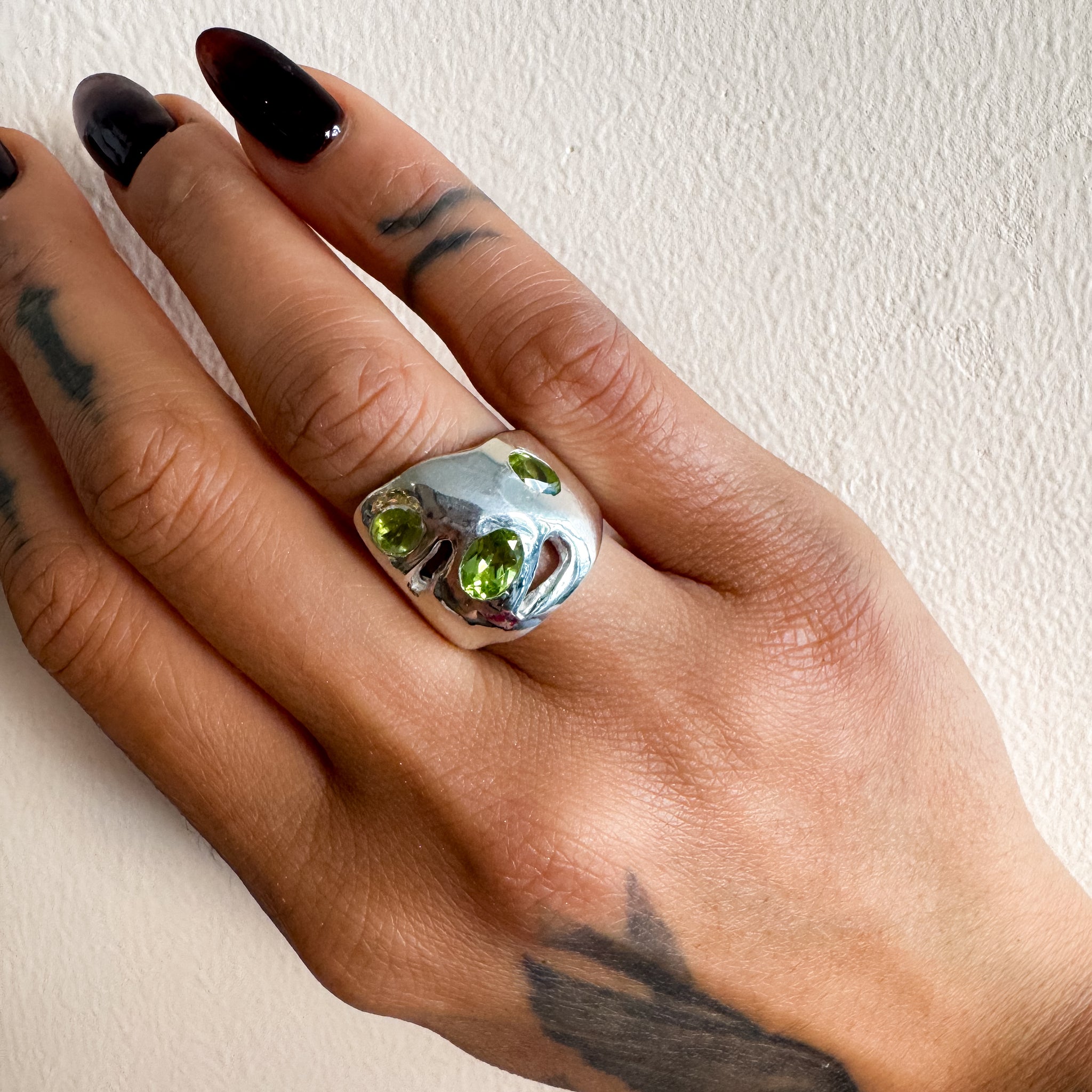 Three peridots Ring